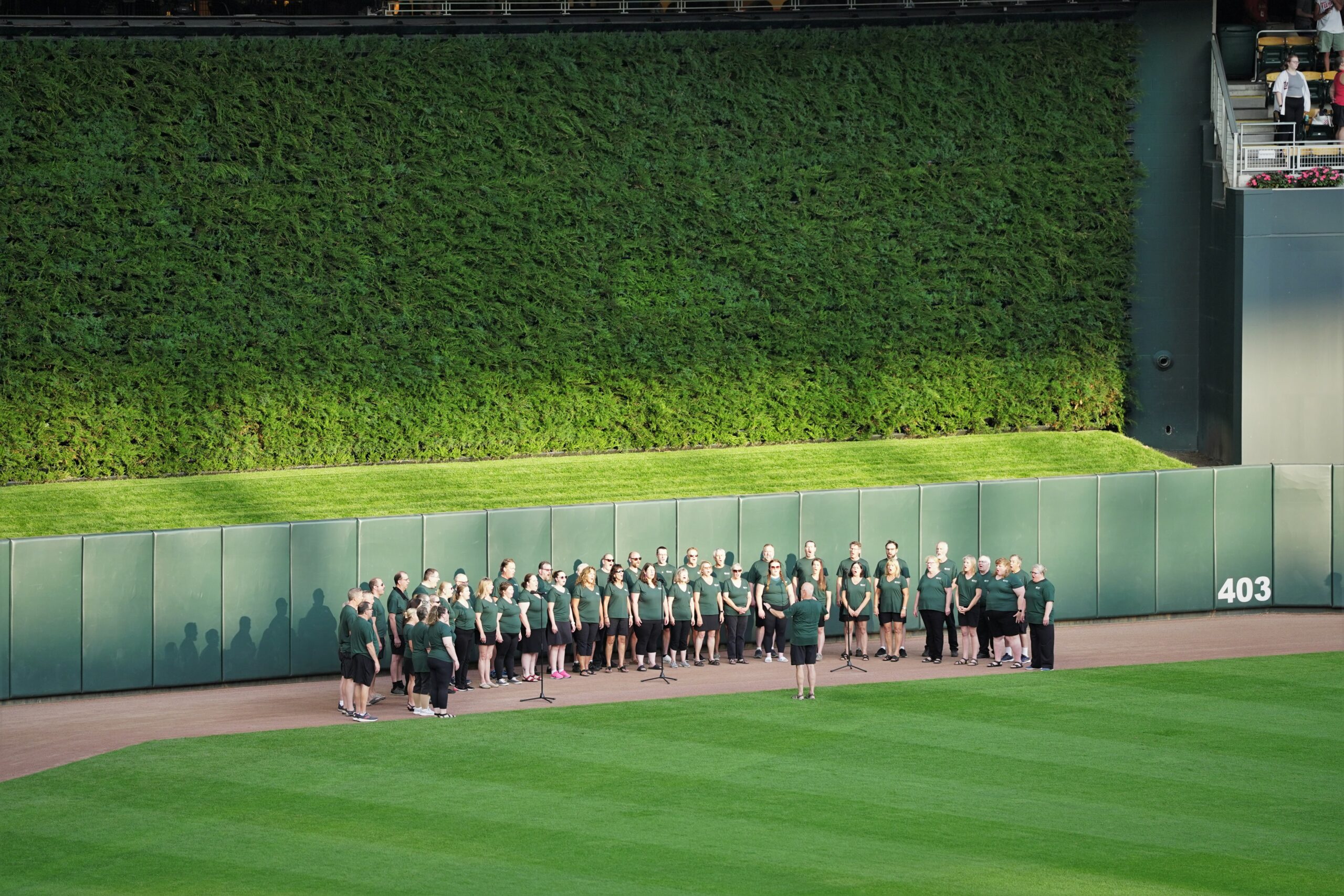 The Bemidji Alumni Choir performs the national anthem before the Minnesota Twins hosted the Texas Rangers for BSU Night at Target Field on Friday, Aug. 25, 2023, in Minneapolis. (Micah Friez / Bemidji State)