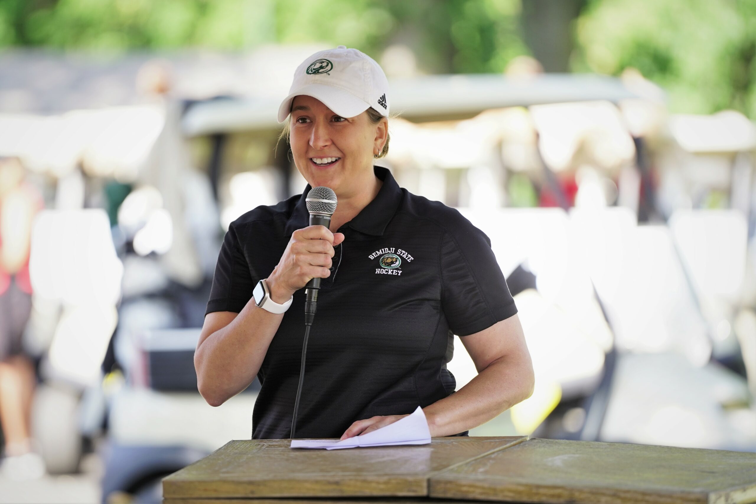 Bemidji State women's hockey associate head coach Amber Fryklund delivers a speech during the Howe-Welle Women's Athletics Golf Tournament on Friday, Aug. 25, 2023, at the Bemidji Town and Country Club. (Micah Friez / Bemidji State)