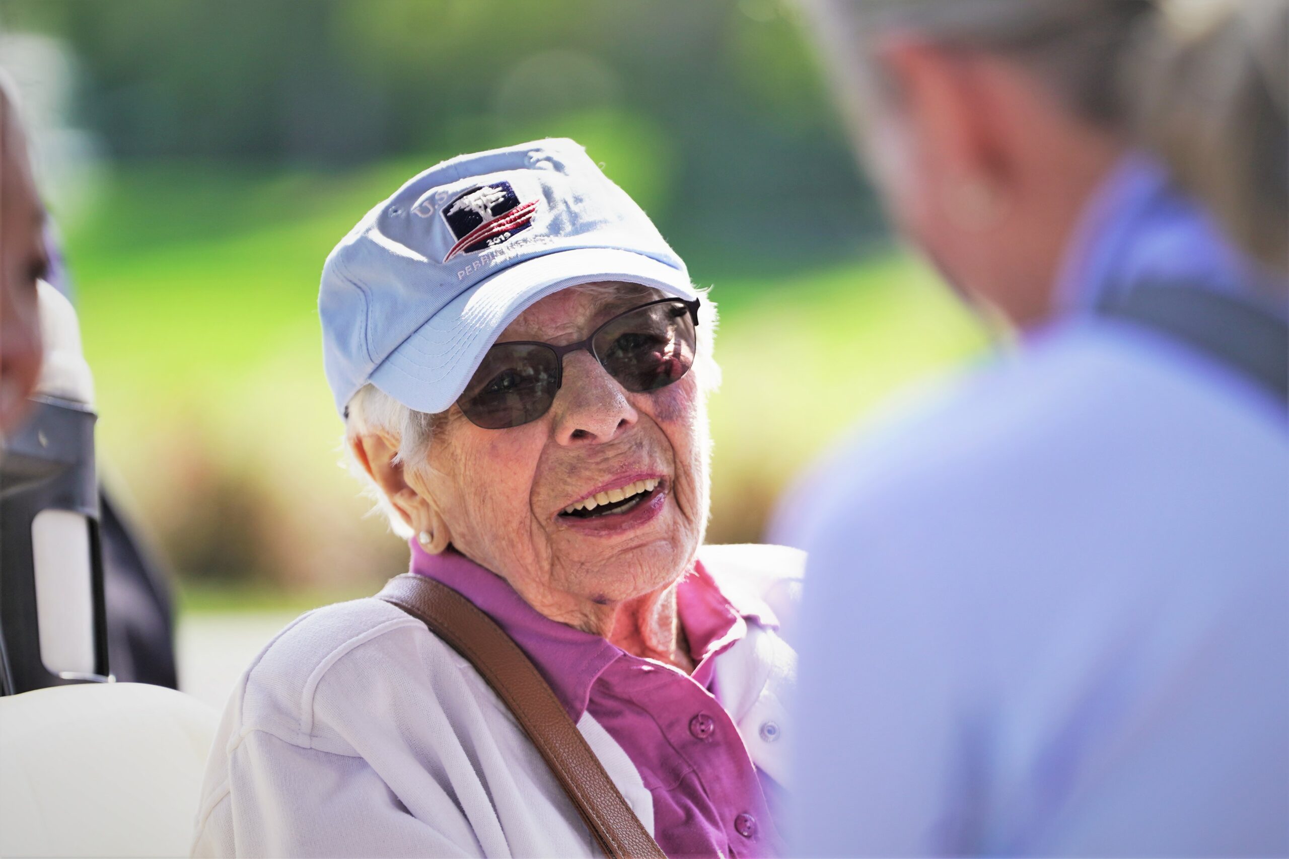 Ruth Howe, an official founder of Bemidji State women's athletics, smiles during the Howe-Welle Women's Athletics Golf Tournament on Friday, Aug. 25, 2023, at the Bemidji Town and Country Club. (Micah Friez / Bemidji State)