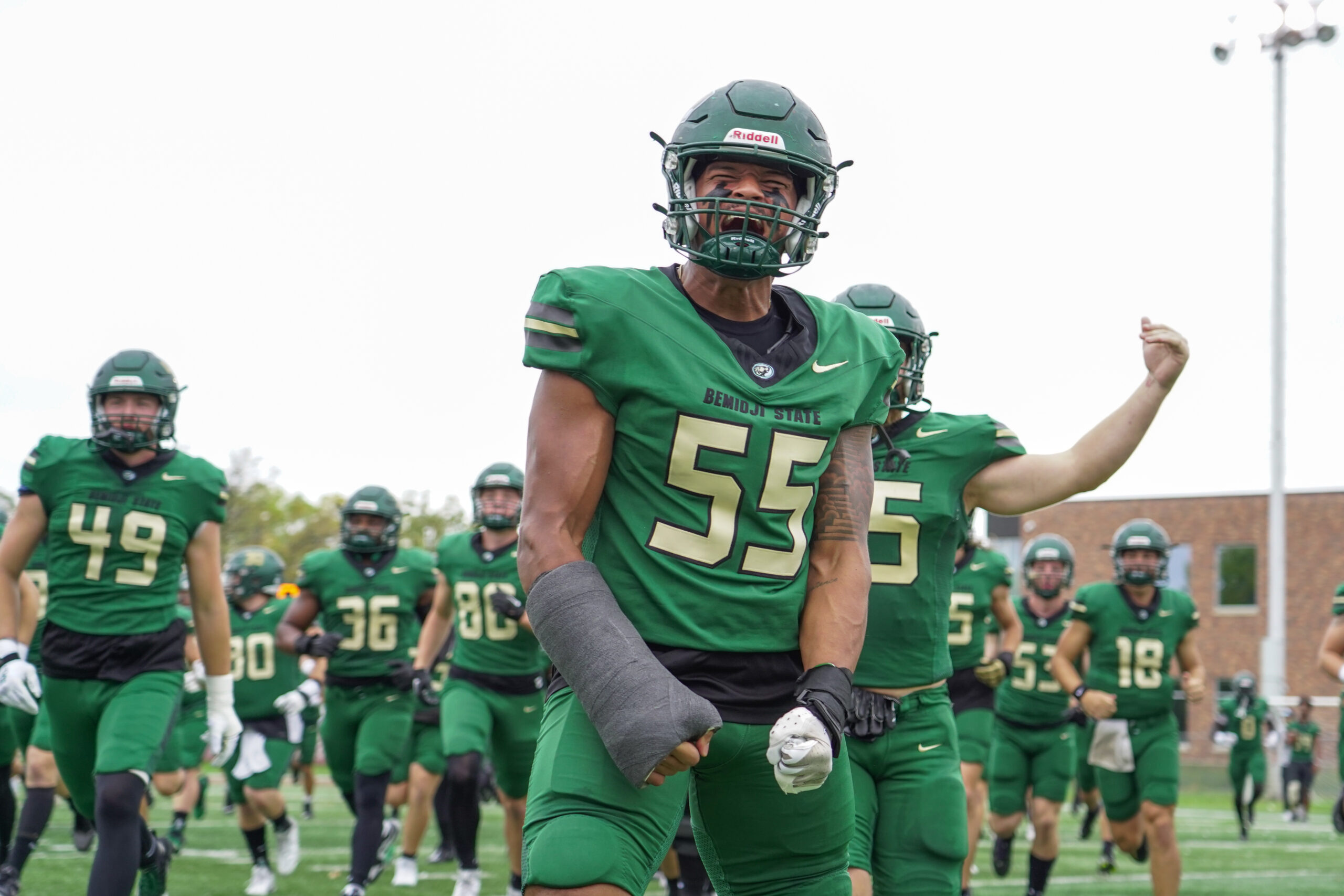 Theodus Ringgold (55) runs out with the Beavers before the start of the Homecoming football game against Minnesota State on Saturday, Sept. 30, 2023, at Chet Anderson Stadium. (Micah Friez / Bemidji State)