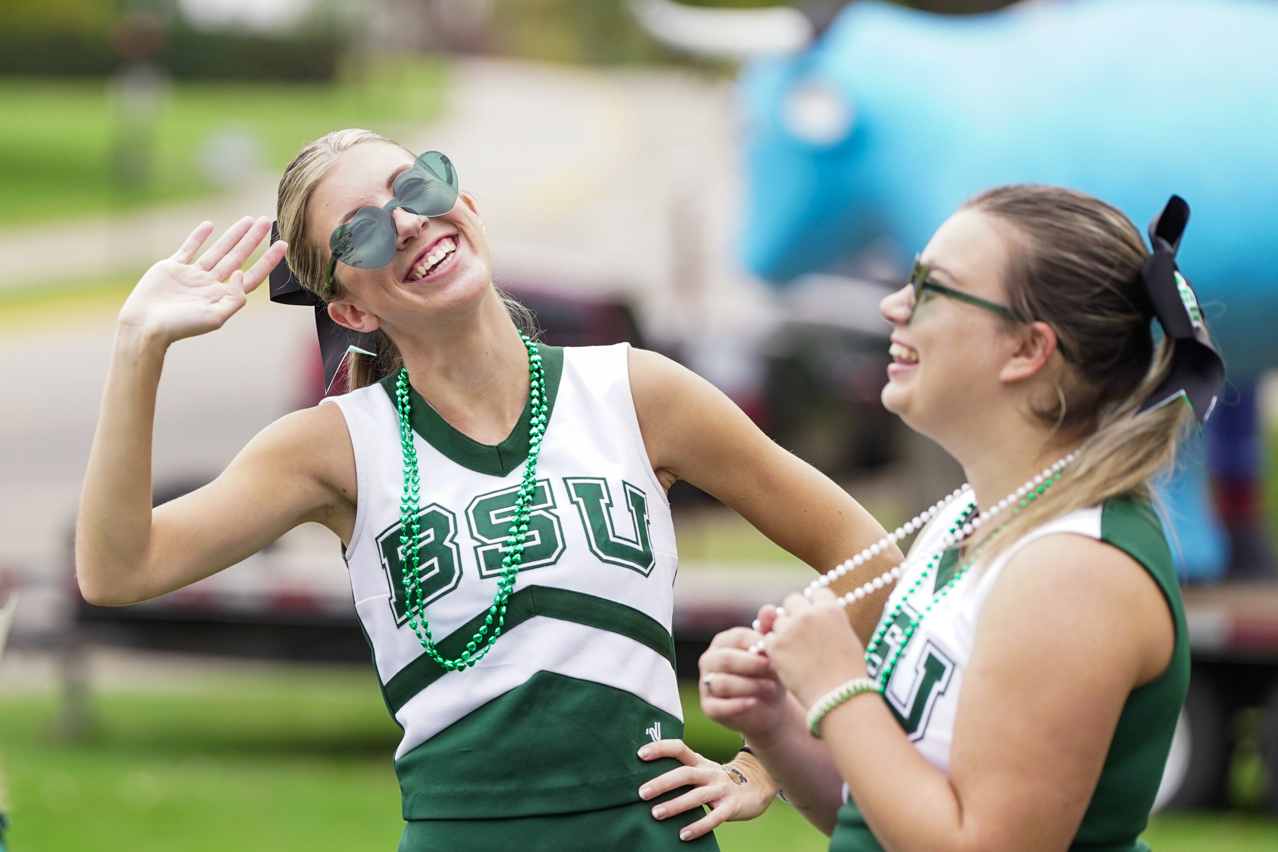 Bemidji State cheerleader Tori Bohney waves during Game Day Experience on Saturday, Sept. 30, 2023, outside of Decker Hall during Homecoming. (Micah Friez / Bemidji State)