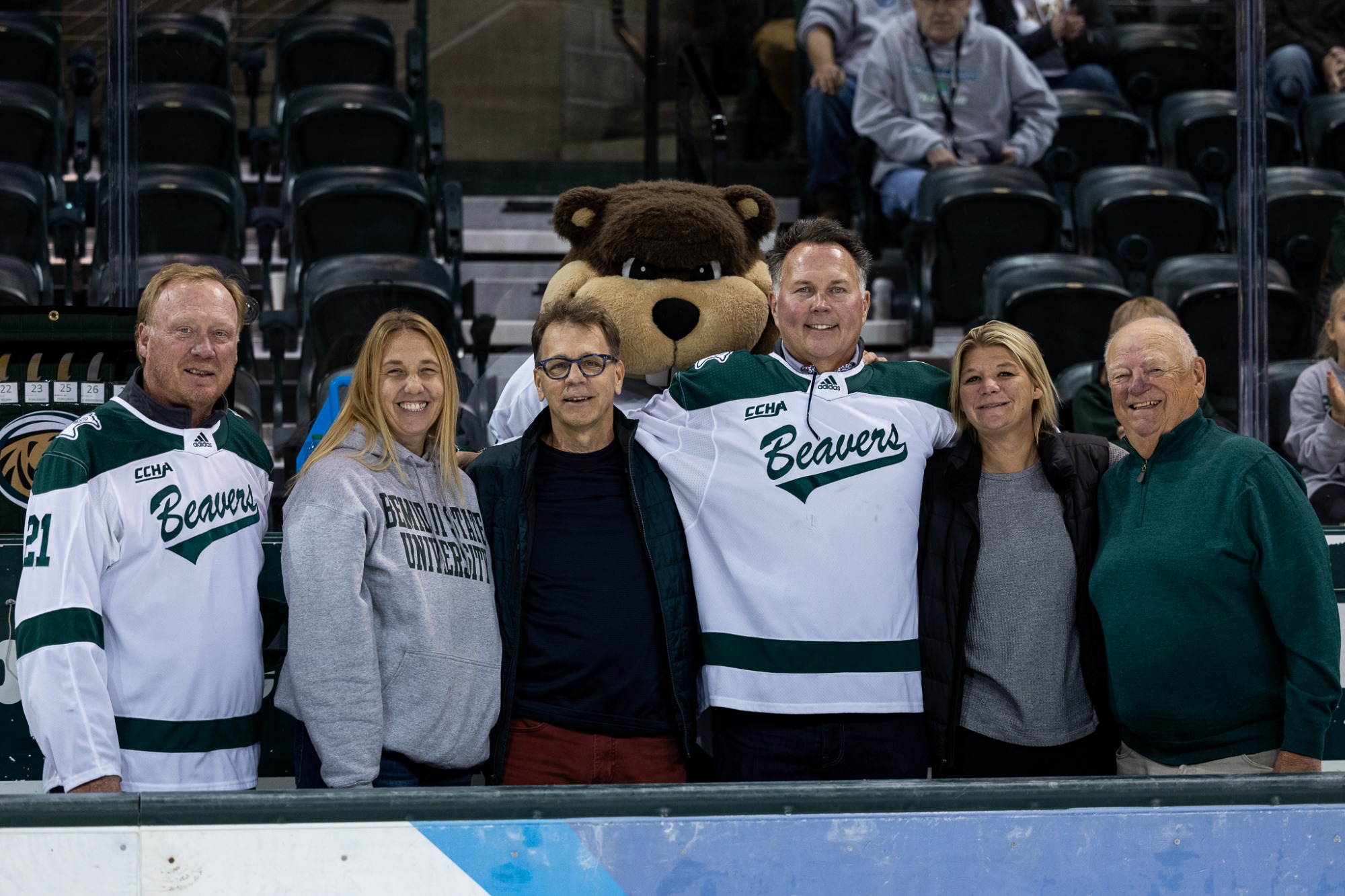 Bemidji State's 2023 individual inductees to the Athletic Hall of Fame, from left, Drey Bradley, Michele (Dinius) Kirby, Tony Kukich, Mark Liska, Kari Torgerson and Dr. Gary Erickson, are recognized during the intermission of a Bemidji State men's hockey game on Friday, Oct. 13, 2023, at the Sanford Center. (Courtesy / Brent Cizek)