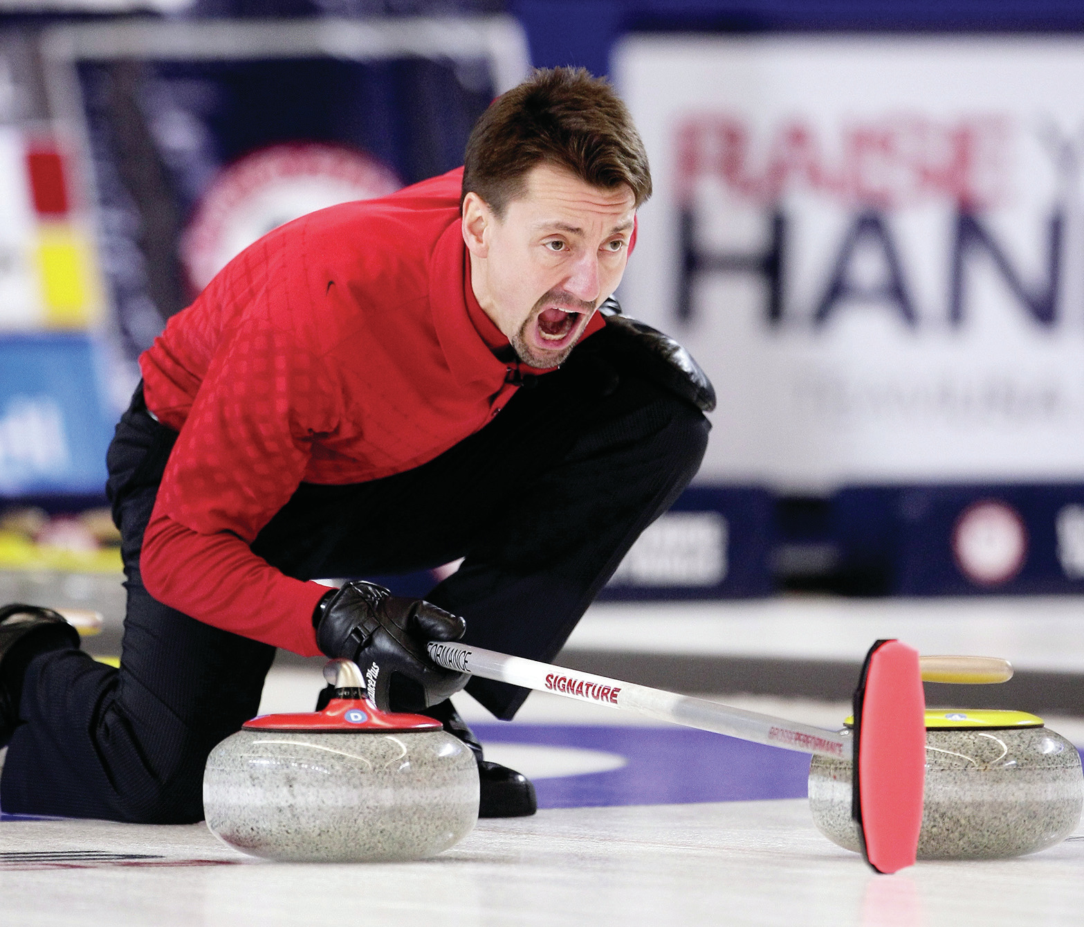 Pete Fenson, skip for Team Fenson, shouts out to teammates during the Olympic Trials for Curling in 2013 at Scheels Arena in Fargo. (Courtesy / Forum News Service)