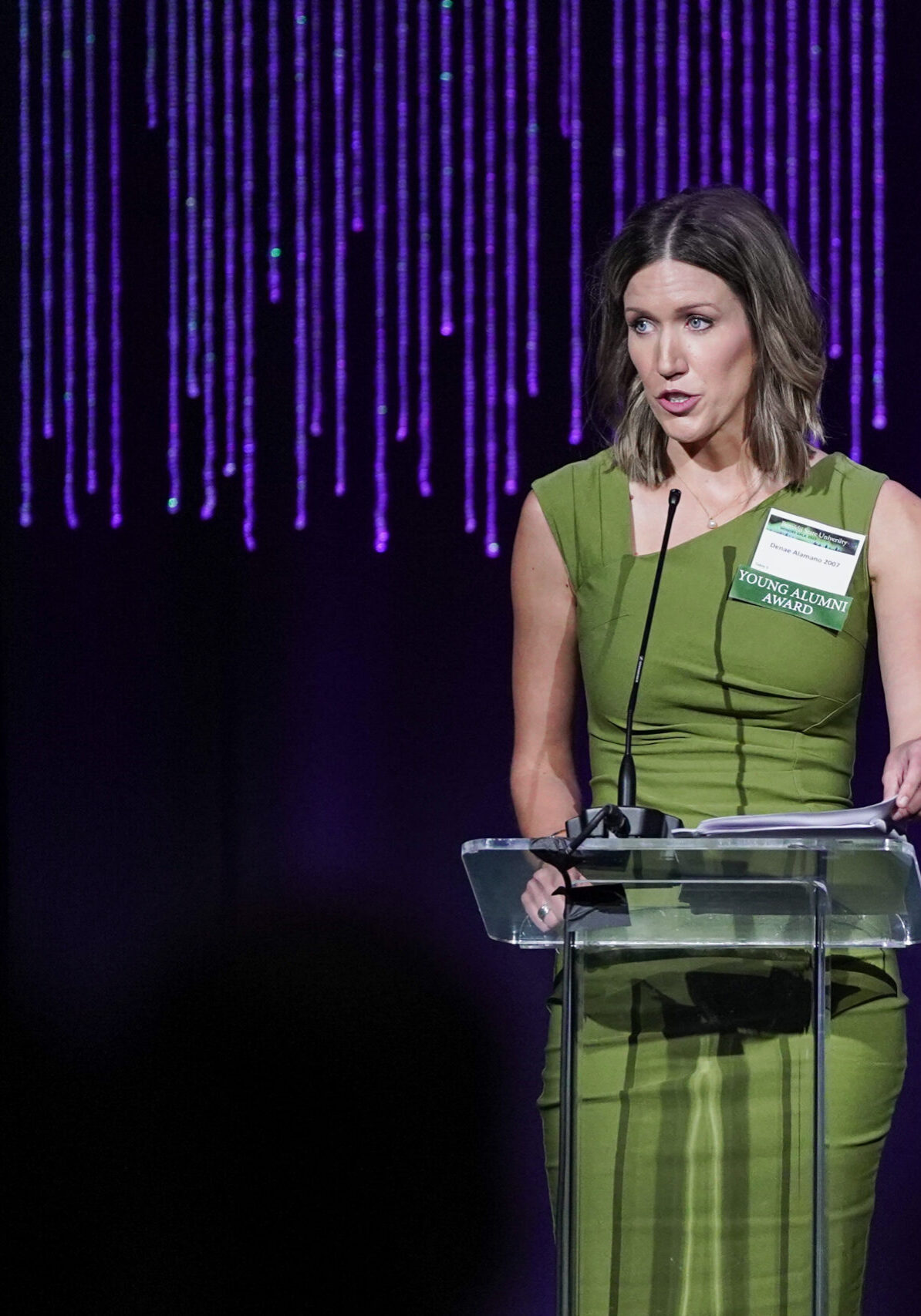 Denae Alamano, a 2023 Young Alumni Award recipient, delivers her speech during the Honors Gala on Friday, Sept. 29, 2023, at the Sanford Center. (Micah Friez / Bemidji State)